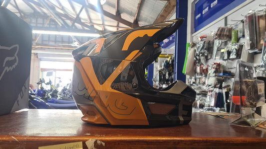 FOX Youth Medium helmet V1 skew, black and gold, RRP $299.95